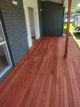 Stained porch decking against Chicago greystone brick